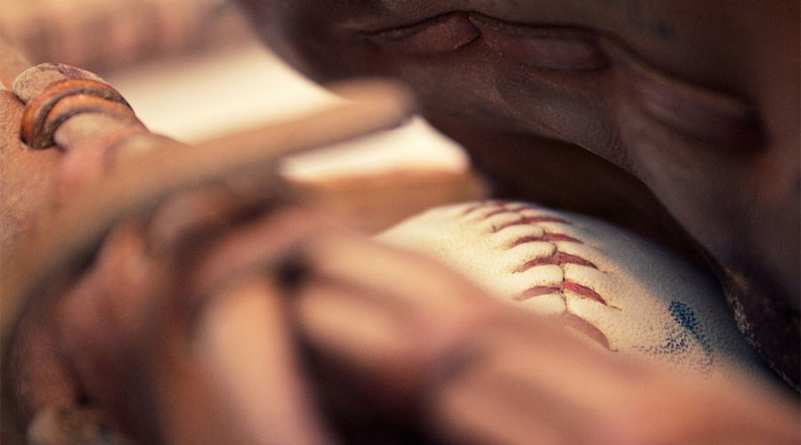 Orlando baseball player holding baseball in glove
