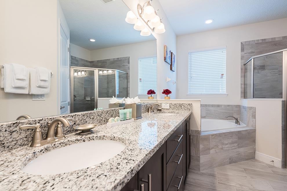 Master bathroom inside a curated Encore Resort residence.