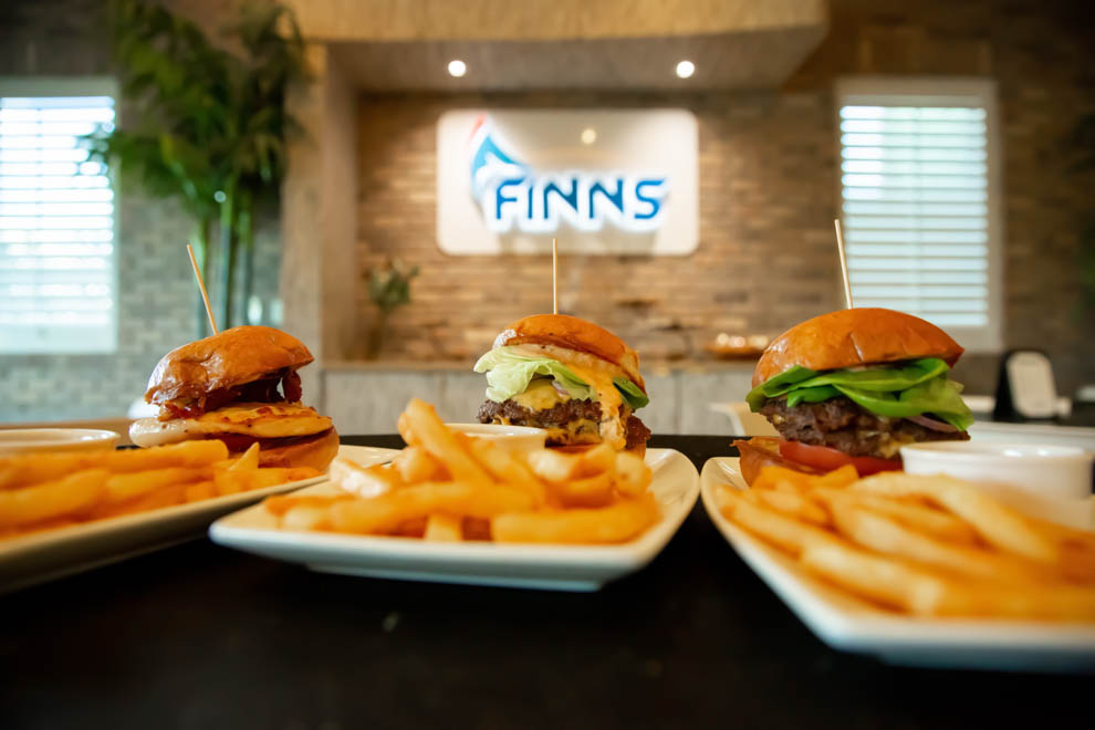 Plates of burgers and fries at Finns Restaurant.