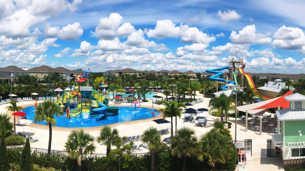Panoramic view of the Encore Resort at Reunion water park, pool, and slides.