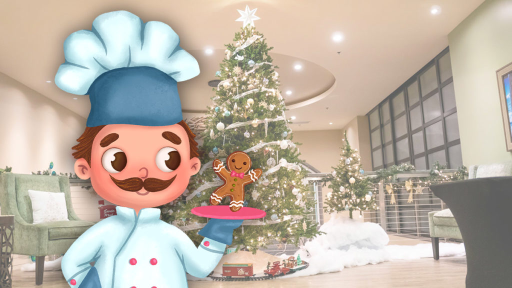 Giuseppe and Gumdrop in front of a Christmas tree