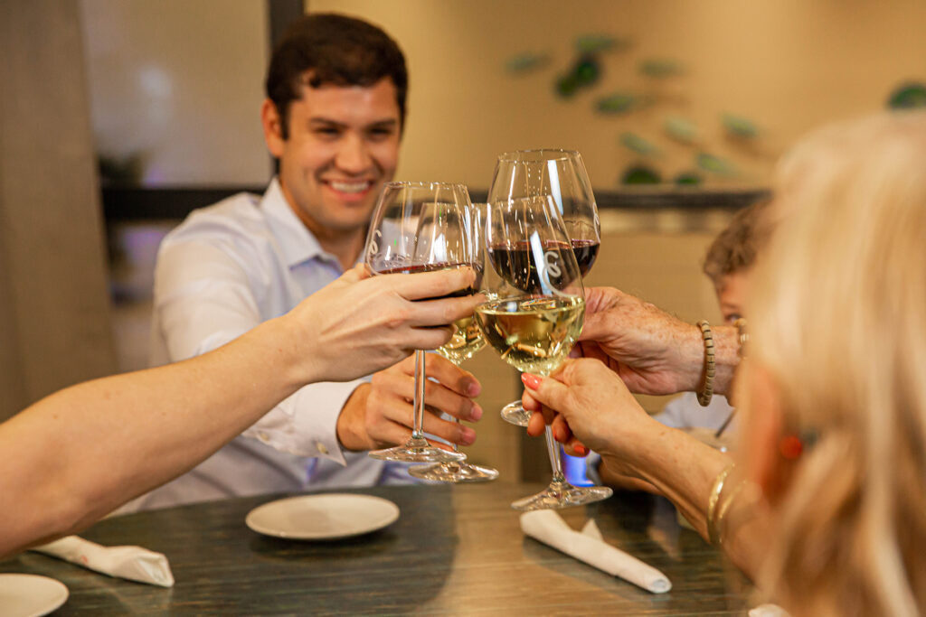 Group sharing a toast at Finns Restaurant